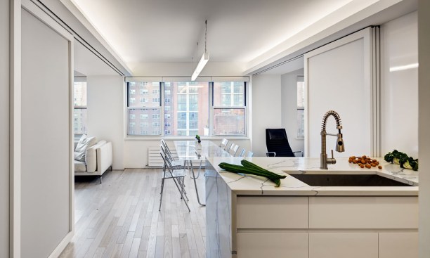 Open Loft Kitchen/Dining  with Sliding Panels in an Open Position