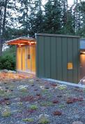 The budget-conscious building is constructed of polycarbonate, wood framing, and metal cladding and is topped with a homemade green roof of drought-tolerant succulents.