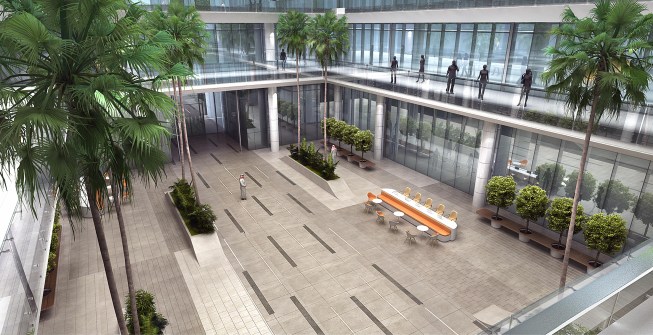 Each of the four interconnected office building has its own atrium to filter indirect natural light to the interiors and promote social interaction. 