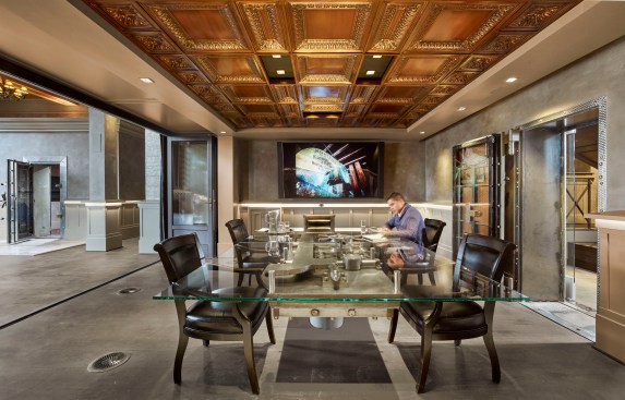 Ground floor meeting room with reclaimed bank vault conference table.