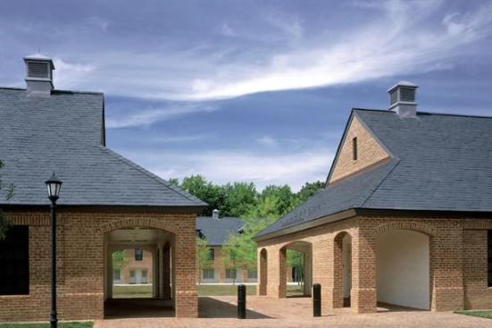 By facing the dormitory buildings onto a central lawn, Muse Architects bestowed a small town feeling on the project. Residents enjoy various levels of public space, including generously sized loggias and a communal lounge.