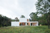 Two volumes create the house’s simple form, seen from the northwest.