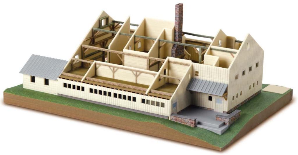 A completed model of a farmhouse printed with the new ZPrinter 450 shows off the machine's ability to print in full color and print patterns imported from image files (note the "stone" chimney).