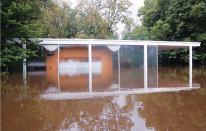 The Farnsworth House on Sept. 14. Because Landmarks Illinois had advanced notice of potential flooding, staff were able to take preventative measures to save furniture.