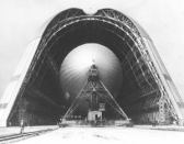 The short-lived dirigible USS Macon and its home, Hangar One, in an undated photo.