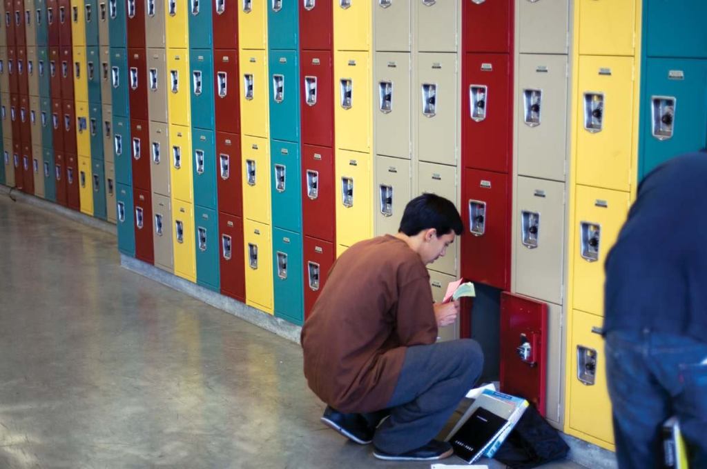 A student stops by his locker at the Miguel Contreras Learning Complex, a high school in west central Los Angeles that opened its doors in September 2006. Designed by Johnson Fain as an "urban village" surrounding a central courtyard, the school has 2,500 students, many of whom had previously been bused to schools outside their neighborhoods because of systemwide overcrowding.