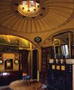 Soane described the breakfast room at No. 13 Lincoln's Inn Fields, as “a succession of fanciful effects, which constitute the poetry of architecture.” A light, shallow dome stretches across the center of the room and is illuminated by an octagonal skylight filled with panels of colored glass.
