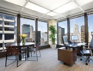 The CEO's office, located in the southwest corner of the building, receives a steady stream of afternoon light from the floor-to-ceiling windows.