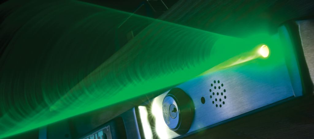 In an emergency, Beacon from Assa Abloy leads the way toward a safe exit. The device connects to a building's fire alarm system and helps occupants exit through the use of audio and visual alerts. Pulsing light combines with white noise, followed by verbal instructions indicating exit locations in one or more languages. In the sequence's final phase, a green laser beam highlights the exit.
assaabloydss.com
