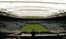 The renovations to Centre Court at London’s All England Lawn Tennis Club, home of the Wimbledon Championships, included the installation of a 56,000-square-foot retractable roof and increased the capacity of the stadium by 1,200 seats.
