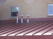 In preparation for an air-pressurization test, exhaust stacks, which are known to be an air pathway, are sealed.
