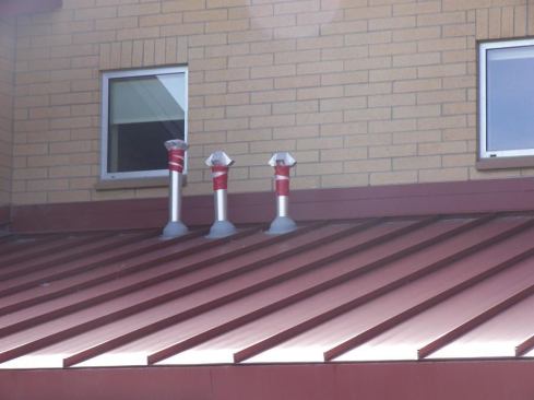In preparation for an air-pressurization test, exhaust stacks, which are known to be an air pathway, are sealed.