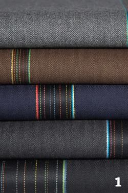 Maharammaharam.com

Herringbone pattern overlaid with intermittent stripes that run the length of the fabric - Available in brown, navy, and heathered gray 100 percent wool - Upholstery weight and contract grade - New addition to fashion designer Paul Smith's Maharam line