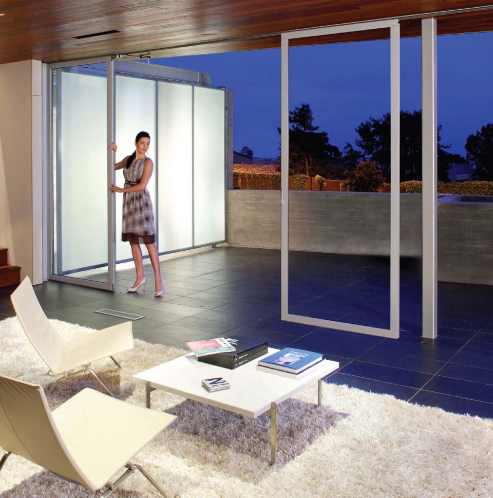 NanaWallnanawall.com

Individual-panel sliding glass door system with no floor track - Same wind load and security features as a model with the track - Can open three walls of a 35-foot-square room - Adjustable floor sockets for securing the doors - The panels recess into a bay on one end of the installation - Swing doors allow for access without opening the entire wall - Not for use where watertightness is a concern