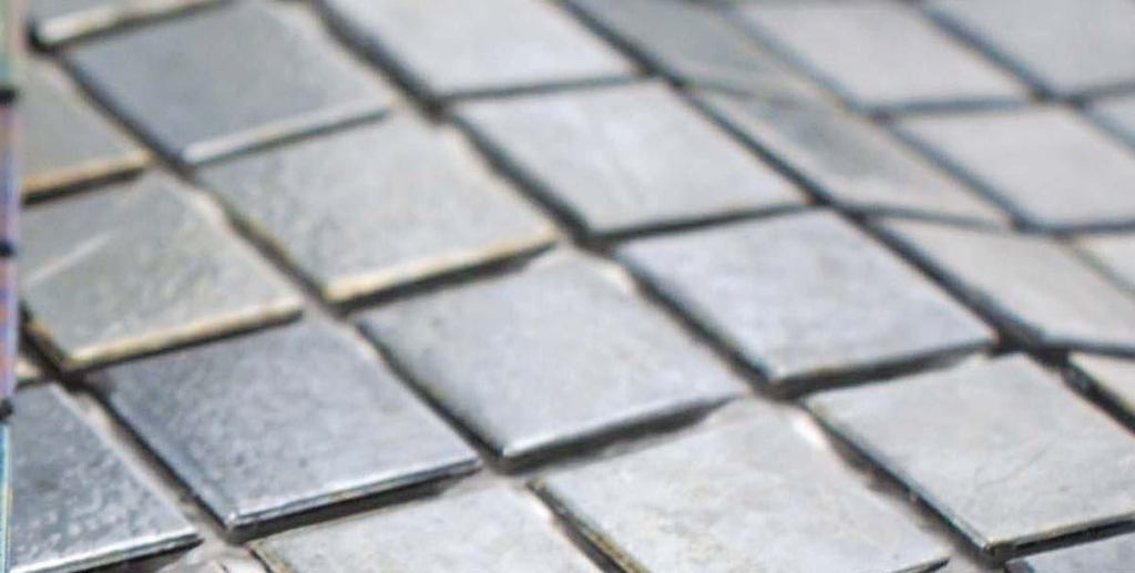 Tivoli glass mosaic tile

Hakataihakatai.com

Iridescent tile Two color options: indigo blend and black gold blend - Made with 70 percent recycled glass - Tiles are 3/4 inch thick and mesh-mounted on a 1.15-square-foot sheet