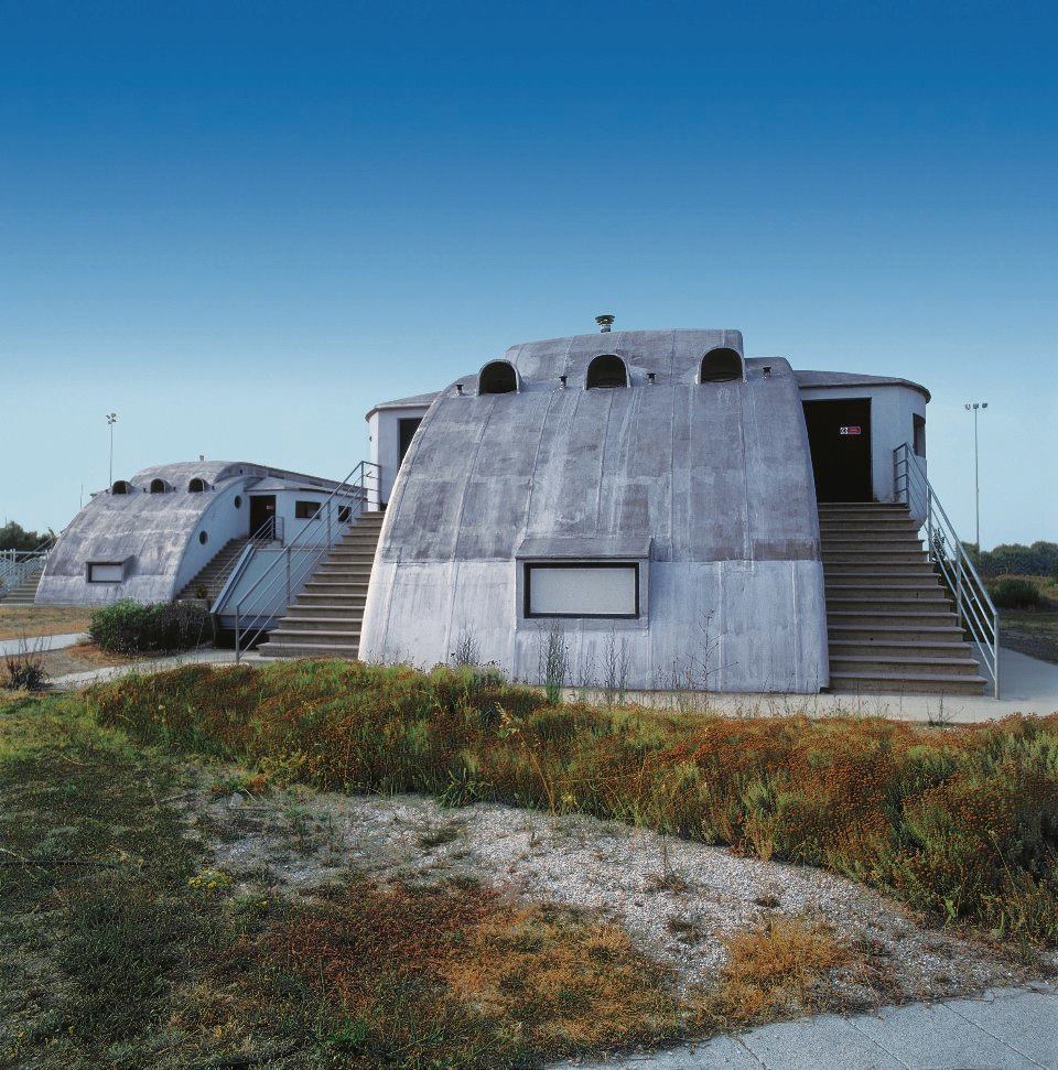 EXHIBIT



Artist Dan Dubowitz and architect Patrick Duerden have roamed northern Italy since 2005, jumping fences and trekking through forests on a quest for the architectural remains of fascist holiday camps that were built during Mussolini's regime in the 1920s and '30s. Photographs of the decaying Modernist buildings are paired with musings from Dubowitz and Duerden in a show at Fermynwoods Contemporary Art, in Brigstock Kettering, England, through July 26.

fermynwoods.co.uk