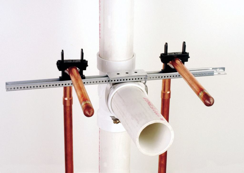 Power Bar
Sioux Manufacturing Co.
siouxchief.com
Universal slider bracket (USB) - 80% stronger than standard USB - Expands to fit cavities 14" to 26" wide - Features dual fastening tabs to ensure secure installation, suitable for securing tub/shower valves, shower risers, tub drops, and any water supply stub out in new construction or remodels