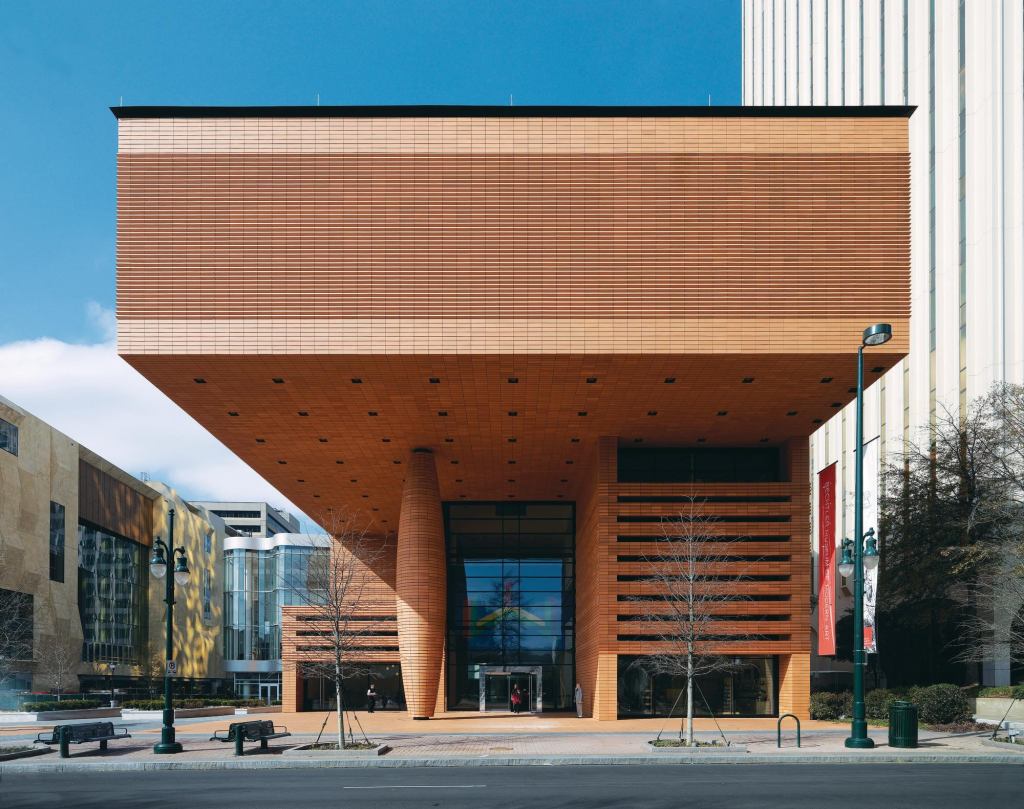 A lone column keeps silent sentry in the plaza of Charlotte, N.C.'s Bechtler Museum of Modern Art, which opened in January. Although the 47-foot-tall pillar is structurally necessary and part of the overall column grid, its girth is deceptive—a convex steel armature encloses the load-bearing concrete column within and supports a skin of terra-cotta tiles—and is meant to convey the building's massiveness.
