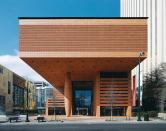 A lone column keeps silent sentry in the plaza of Charlotte, N.C.'s Bechtler Museum of Modern Art, which opened in January. Although the 47-foot-tall pillar is structurally necessary and part of the overall column grid, its girth is deceptive—a convex steel armature encloses the load-bearing concrete column within and supports a skin of terra-cotta tiles—and is meant to convey the building's massiveness.