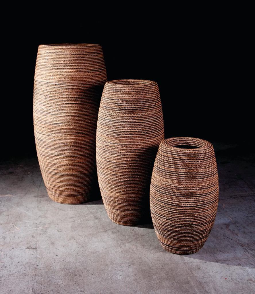 Phillips CollectionÕs NatureÕs Planters are made of natural materials, including abaca (a type of banana indigenous to the Philippines) leaves and other types of banana leaves, along with natural weave and wood, that are later covered in many layers of resin to give them strength and luster. The collection is made up of two styles, Classic and Elonga, and three sizes. For a more contemporary look, polished aluminum and polished bronze finishes are also available. The collection was designed by Fred van Bedijk. phillipscollection.com