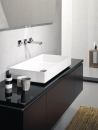 The Metaphor basin from Alape has thin but sturdy walls and a sleek, cubic silhouette. At 4" tall and 14 3/4" deep, the surface-mount, glassed-steel basin is available in three widths—39 3/8", 29 1/2", and 19 3/4"—with optional towel bars. alape.com
