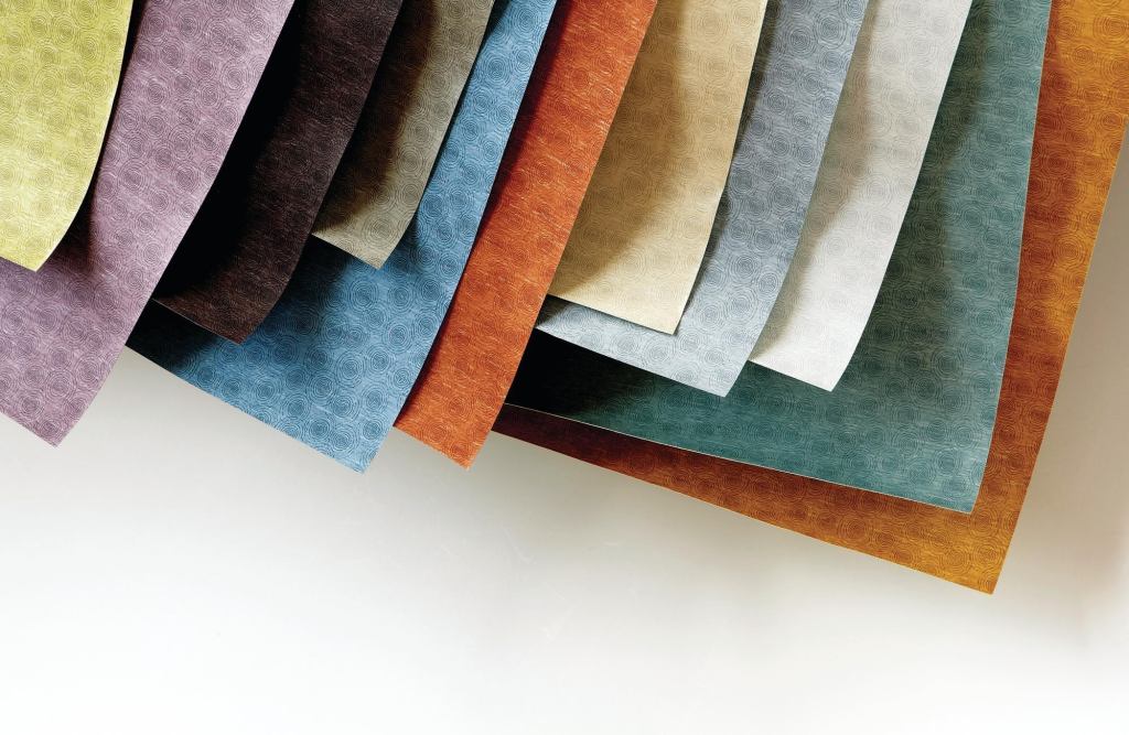 The Campione Collection from Designtex has three new multiscaled patterns: Corda features a slightly irregular stripe, Ondina (shown) is inspired by the ripple effect created by water droplets, and Stampato plays on positive and negative space on variegated ground. Corda is available in 18 colorways, Ondina in 16, and Stampato in 13. The wallcovering contains 30% recycled content-20% post-consumer recycled polyester and 10% pre-consumer recycled vinyl-and is applied with the company's Recore Recycled Wall Technology backing.  designtex.com