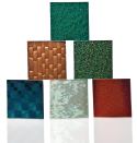 The Modono Glass Tile Collection is manufactured using dichroic thin-film technology to manage the transmission, reflection, and absorption of specific light wavelengths to produce a color-changing tile. The collection comes in sizes from 3" by 3" to 12" by 28" in four series, each with a variety of color and pattern options. ¢ modonoglass.com