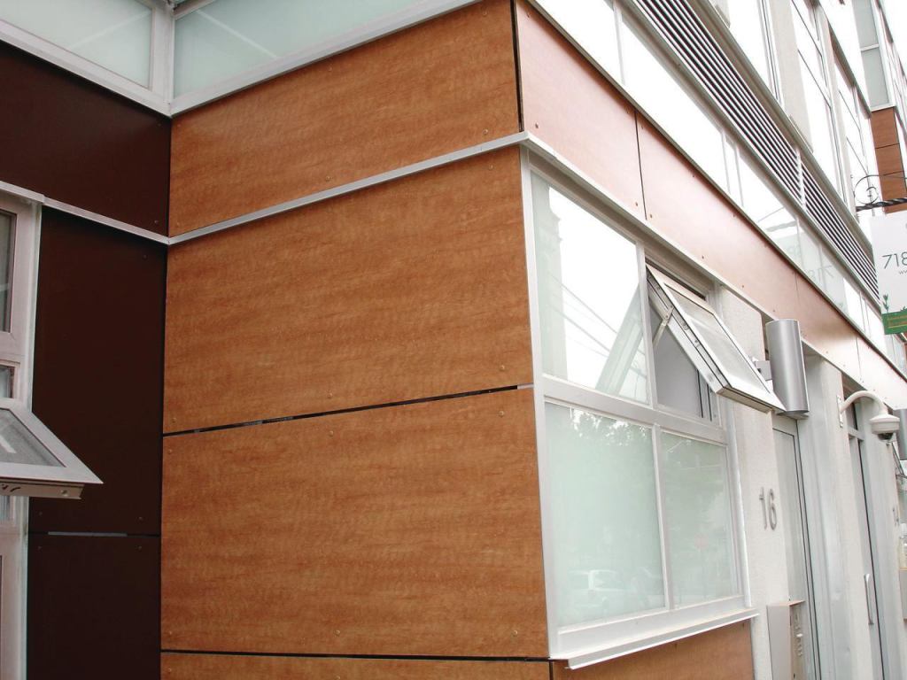 Abet Laminatis Exterior Building Panels are applied using an open-joint rainscreen and are available in thicknesses from 6mm to 10mm. The exterior compact grade laminate panels are manufactured as a one-piece construction in which layers of kraft paper are impregnated with thermosetting phenolic resins bonded under heat and high pressure. They are graffiti proof and vandal- and fire-resistant, will not delaminate, and are suited for high-abuse areas. The panels are available in 41 standard colors and patterns, and digitally printed custom patterns or images can be set on the face. abetlaminati.com