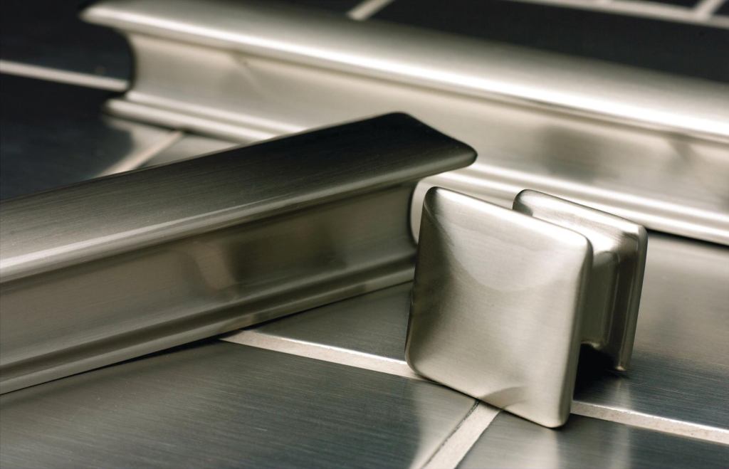 The Legacy Collection of decorative hardware from Atlas Homewares is made up of five designs (Bronte, Austen, Alcott, Dickinson, and Canterbury) based on simple round, oval, square, and octagonal shapes with designer touches, such as beveled edges and detailed stems. Bronte, Austen, Alcott, and Dickinson include one knob and two pulls and come in brushed or polished nickel and Venetian bronze. Canterbury also includes one knob and two pulls, and comes in red, black, and burnished bronze or burnished bronze with an inlaid design and lacquer finish. The hardware is suitable for cabinetry or furniture. atlashomewares.com