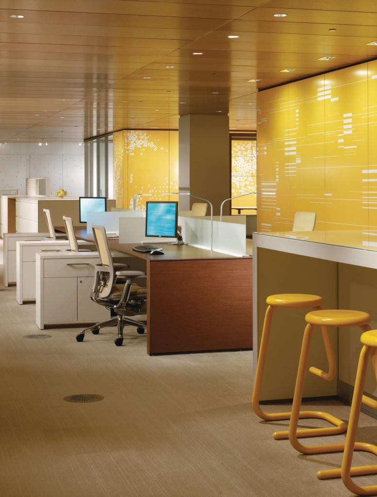 This desking product, part of Haworths Compose line, includes a 29"-high panel, power routing and access below the work surface, a frameless glass topper, wood trim components, and knife-edge work surfaces. It can be arranged in a benching configuration as well as in other desking applications; the top trim of the 29" panel lines up with the tops of work surfaces, providing a clean aesthetic. The panel height also provides power and data routing below the work surface and at base locations. A new three-way tile spanning kit eliminates reveal lines usually found at a three-way junction. It comes in the same surface options and with the same adaptable components as existing Compose products. haworth.com