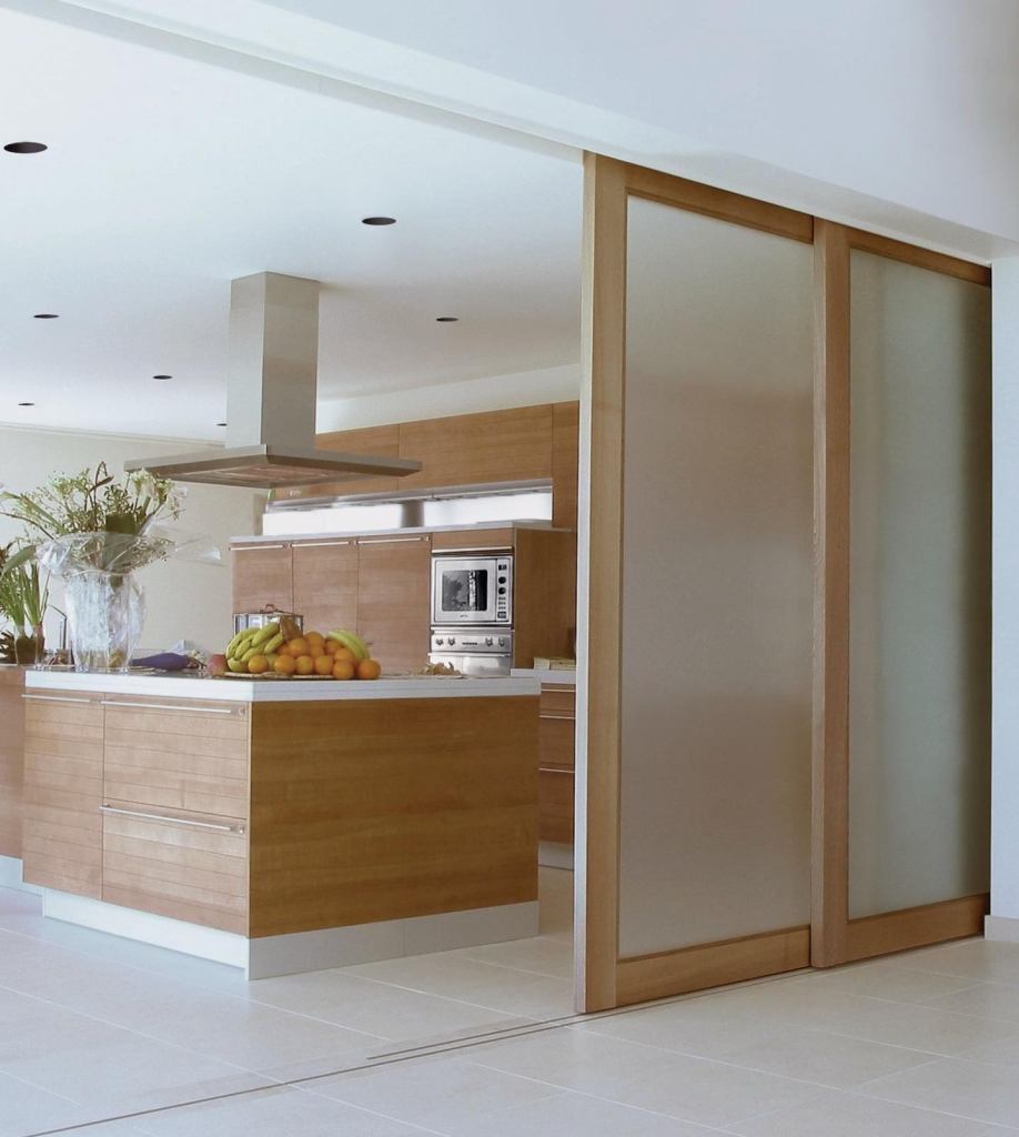 Johnson Hardwares 200MD Multi Pass Hardware series is a track system that can handle individual sliding door panels with widths up to 48, each weighing up to 300 pounds. The hardware also can be ordered to accommodate up to four panels side by side. The track, made of an extruded aluminum I-beam, can be specified up to 192" with special orders available. The series comes with four-wheel ball-bearing hangers with 1" wheels and a guide with steel-reinforced nylon posts. The track system is suitable for a range of uses. It can be substituted for a pocket door to separate kitchen and dining areas, used in a room that doubles as a home office and childs play area, or can help separate areas in a loft. johnsonhardware.com