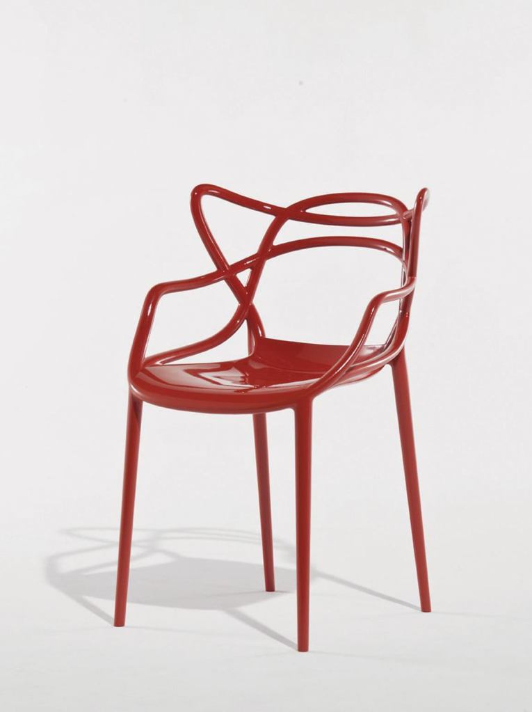 Designed by Philippe Starck in conjunction with Eugeni Quitllet, the Masters chair from Kartell combines the silhouettes from three of the best known chairs of modern times: the Series 7 Chair by Arne Jacobsen, the Tulip Armchair by Eero Saarinen, and the Eiffel Chair by Charles and Ray Eames. The chair is made of batch-colored polycarbonate and supported by four slender legs, but its most notable feature is the back, composed of the curving lines of the three chairs it pays homage to. The chair comes in three colors: white, red, and black. It measures 32.7" tall by 21.3" wide by 21.3" deep with a seat height of 18.5". kartell.it