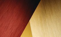 Proximity wallcovering from Versa has vertical lines meant to resemble landscapes such as striated riverbeds and wheat fields. It has 21 designs (including Sonoma grape, Aegean blue, Santa Fe Desert brown, Mesa Verde copper, Seattle gray, and Venice Beach white) and is made with Second-Look technology, which has 20% recycled content (10% of which is post-consumer). Second-Look contributes toward LEED points by recycling used wallpaper. Proximity is composed of 20-ounce, low-VOC, Type II vinyl on Osnaburg backing and uses water-based inks and adhesives. It measures 52" or 54" and is available with Permavent, a microventing technology that allows walls to breathe. versawallcovering.com