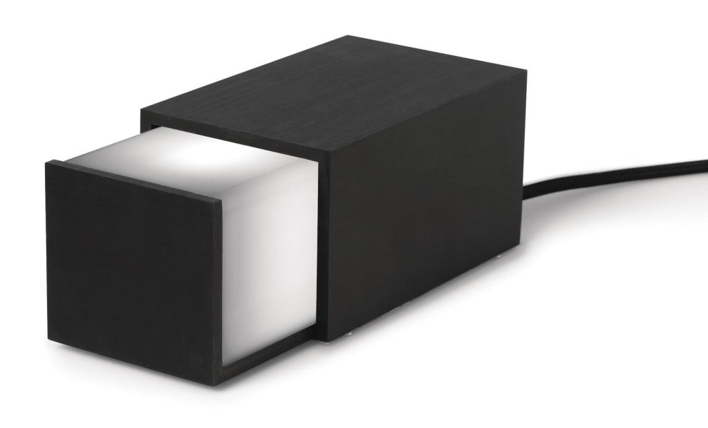 Jonas Hakaniemis Box Light is a lamp hidden in a box. Users can slide the lid open to let light flood out or close it to turn off the lamp. With no dimmers or redundant technology needed, the Box Light has a straightforward interactive design. Available in black or gray, it consists of an aluminum box and a white plastic shade. It measures 4" wide by 3-1/4" tall by 6" deep. A bulb is included, and the fixture is available through Design House Stockholm. designhousestockholm.com