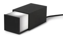 Jonas Hakaniemis Box Light is a lamp hidden in a box. Users can slide the lid open to let light flood out or close it to turn off the lamp. With no dimmers or redundant technology needed, the Box Light has a straightforward interactive design. Available in black or gray, it consists of an aluminum box and a white plastic shade. It measures 4" wide by 3-1/4" tall by 6" deep. A bulb is included, and the fixture is available through Design House Stockholm. designhousestockholm.com