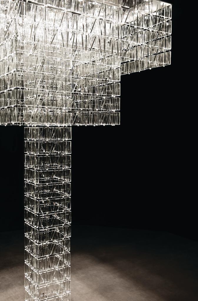 Tile by Fabbian is a building block that allows designers to build chandeliers, room partitions, and focal points. After a specifier determines dimensions and pattern, a custom system is created based on a projects needs. Crystal glass is faceted into a 4"-by-9" clear, blue, or amber tiles that clip into a cable-suspension system. A polished aluminum ceiling channel anchors the cables and also houses the lamping and electrical components. Available with either a halogen 20W MR16 or LEDs with color temperatures ranging from 2,700 K to 6,000 K; RGB LEDs are also available to create static or dynamic colored lighting effects. The modular lighting system was designed by Pamio Design. tile.fabbian.com/en