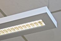 The new Series 52 direct-indirect pendant from Cooper Lighting brand Neo-Ray provides at least 90% efficiency, making it compliant with multiple energy codes. Available with single or double T5/T5HO or T8 lamps for design flexibility, the Series 52 fixture provides uniform illumination (60% up and 40% down). Its semi-specular parabolic louver features a ribbed clear overlay for precise optical control. Available in 3', 4', 6', and 8' lengths, the fixture can be hung by aircraft cable or can be stem or canopy mounted. The pendants extruded aluminum housing measures 1-3/4" wide by 7-1/4" long and ensures ultrastraight runs. Mitered ends provide a clean finish detail. neoray-lighting.com