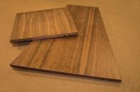 Veneer-wrapped aluminum panels allow greater design flexibility for ceiling and wall systems. These panels from Contact Industries range from 1' by 1' up to 4' by 8' and come in several shapes, including triangles, trapezoids, squares, and rectangles. The aluminum core products come from several manufacturers (including Hunter-Douglas and Simplex), and Contact Industries applies veneer to the face and each of the four edges. Components can be delivered prefinished with a variety of options, including fire-retardant coatings and custom tinting to match specified colors. Lineal veneered aluminum components up to 16' long with face widths ranging from 2" to 8" are also available. contactind.com