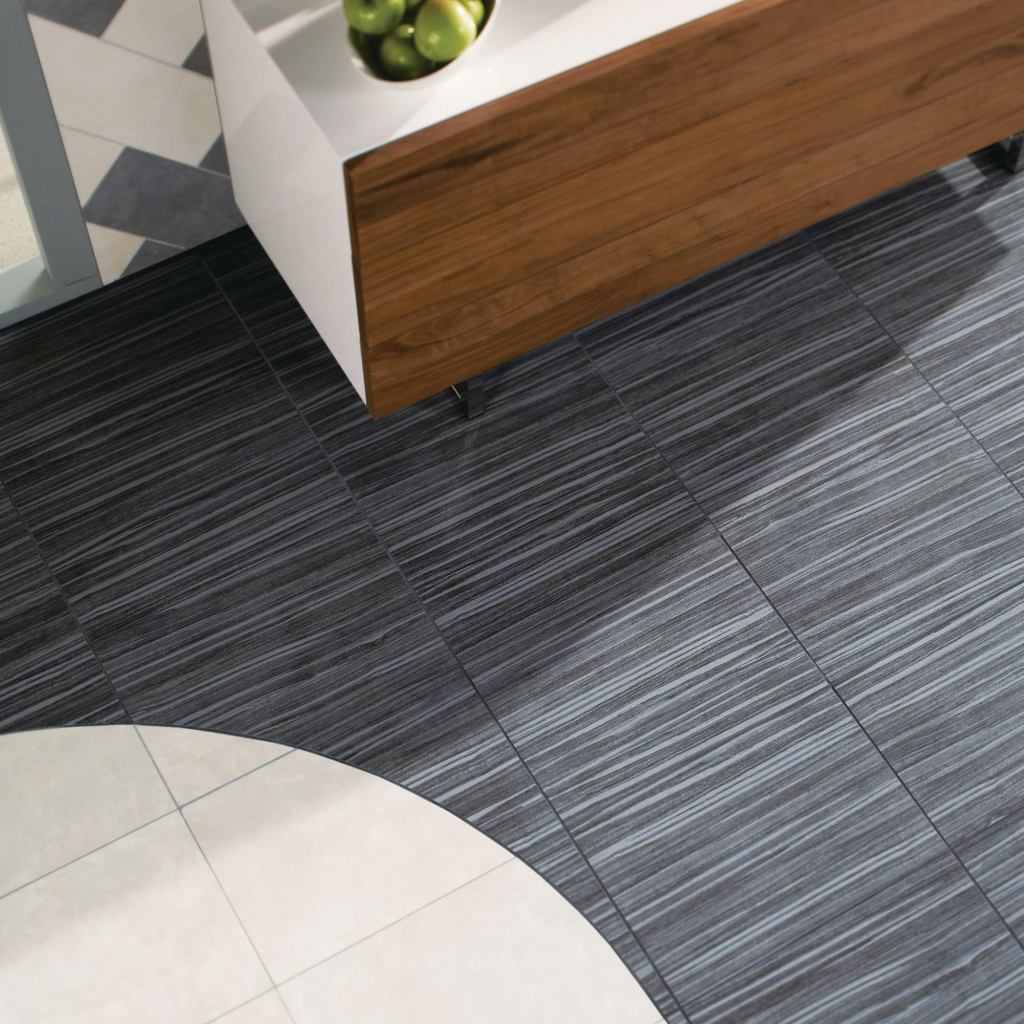 Dal-Tiles new line of ColorBody porcelain tile, Veranda Tones, has a multicolor wood look designed to coordinate with the companys Veranda series. The tiles feature detailed linear graining and high shade variation and come in five earthy color blends. Each Veranda Tone blends three different solid colors from the existing Veranda series, now called Veranda Solids. Veranda Tones is available in three TruEdge rectified modular sizes (6-1/2" by 20", 13" by 20", and 20" square). The tile collection is suitable for floors, walls, backsplashes, countertops, and pool linings in both residential and commercial settings, as well as exterior floors and walls in freezing and non-freezing climates. daltileproducts.com/veranda