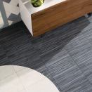 Dal-Tiles new line of ColorBody porcelain tile, Veranda Tones, has a multicolor wood look designed to coordinate with the companys Veranda series. The tiles feature detailed linear graining and high shade variation and come in five earthy color blends. Each Veranda Tone blends three different solid colors from the existing Veranda series, now called Veranda Solids. Veranda Tones is available in three TruEdge rectified modular sizes (6-1/2" by 20", 13" by 20", and 20" square). The tile collection is suitable for floors, walls, backsplashes, countertops, and pool linings in both residential and commercial settings, as well as exterior floors and walls in freezing and non-freezing climates. daltileproducts.com/veranda