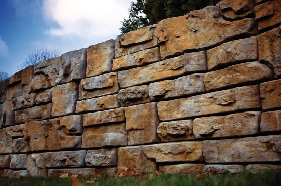 Redi-Rock Ledgestone, a new retaining wall face from Redi-Rock International, gives structural walls a rugged, natural look. The stones can be used to build tall gravity walls; users can achieve more height with reinforcement. Middle blocks weigh 2400 pounds, measure 46" by 41" by 18" high, and offer 5.75 square feet of face. redi-rock.com