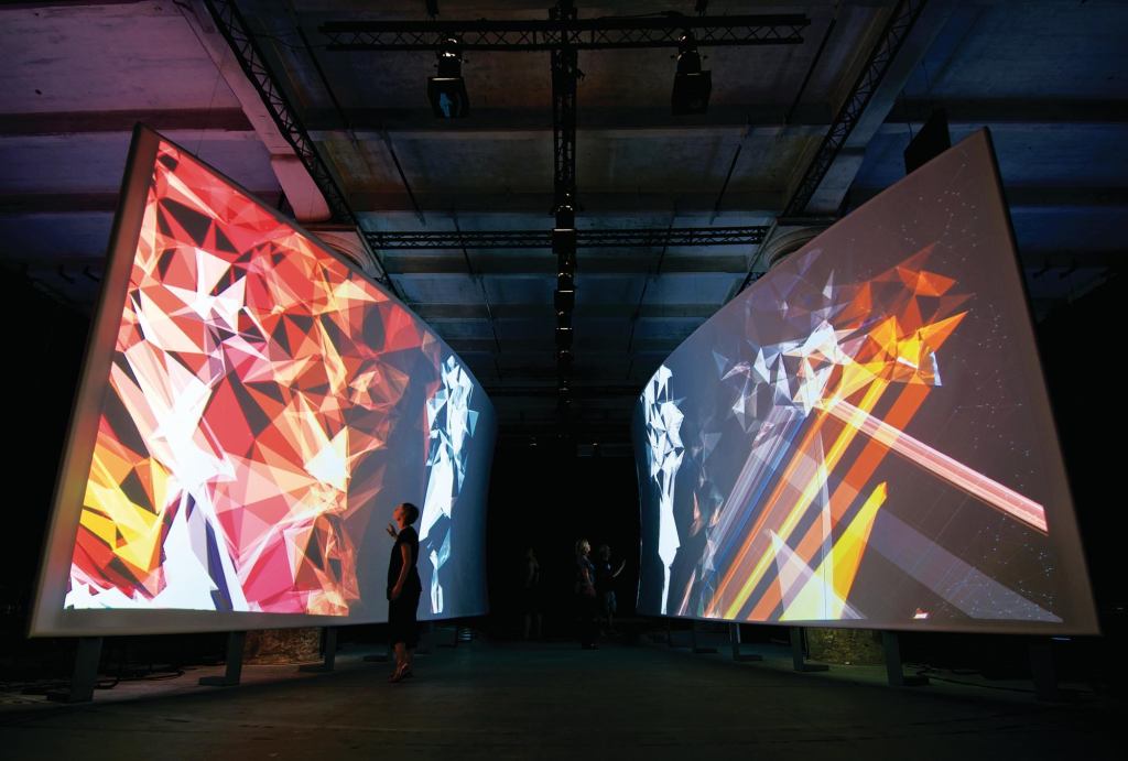 In "Hall of Fragments", a 2008 Venice Architecture Biennale installation designed by the Rockwell Group and Jones|Kroloff, visitors' movements affected the videos continuously projected onto two screens.