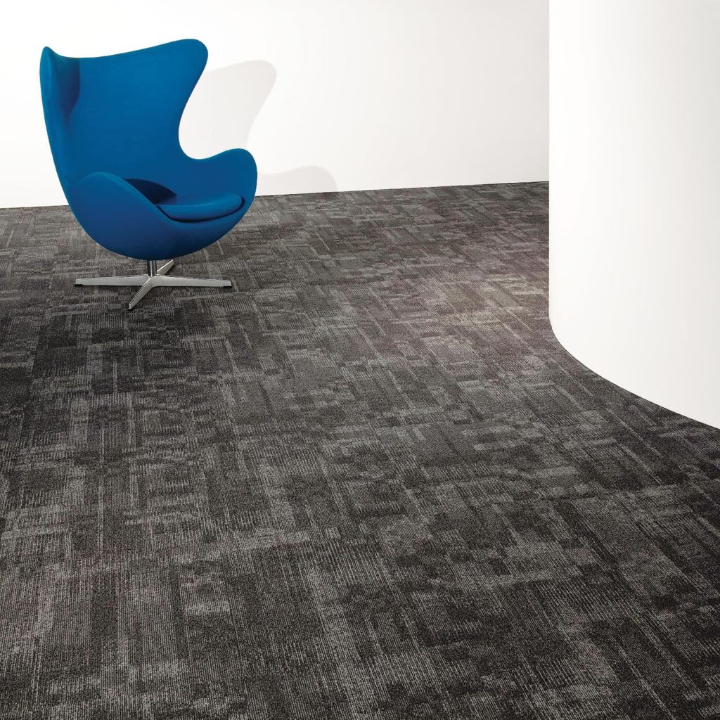 Milliken Contract’s Ghost Artist carpet collection takes its inspiration from architectural details by unknown designers. It is available in four patterns—Facade (shown), Semblance, Trace, and Shadowpoint—in 16 coordinating colors. Durable enough for high-traffic areas, the carpets come in 50-centimeter-square modular Underscore ES Cushion tiles. They are carbon neutral and PVC-free; certified Sustainable Platinum under the SMaRT standards; and certified to Gold level under NSF 140.

millikencontract.com