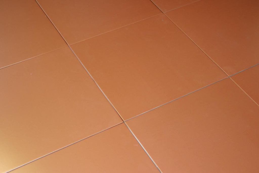 Commercially rated ceramic Metallic Tile from Imagine Tile mimics the look of metals by mixing real metallic elements into the glaze. It is available in four colors (copper, stainless steel, nickel, and bronze) and four sizes (16" square, 8" square, 4" square, and 3" by 6"), with additional sizes on special order. The tile is offered in flat designs currently, but Imagine Tile plans to release brushed swirl and linear in the future. imaginetile.com