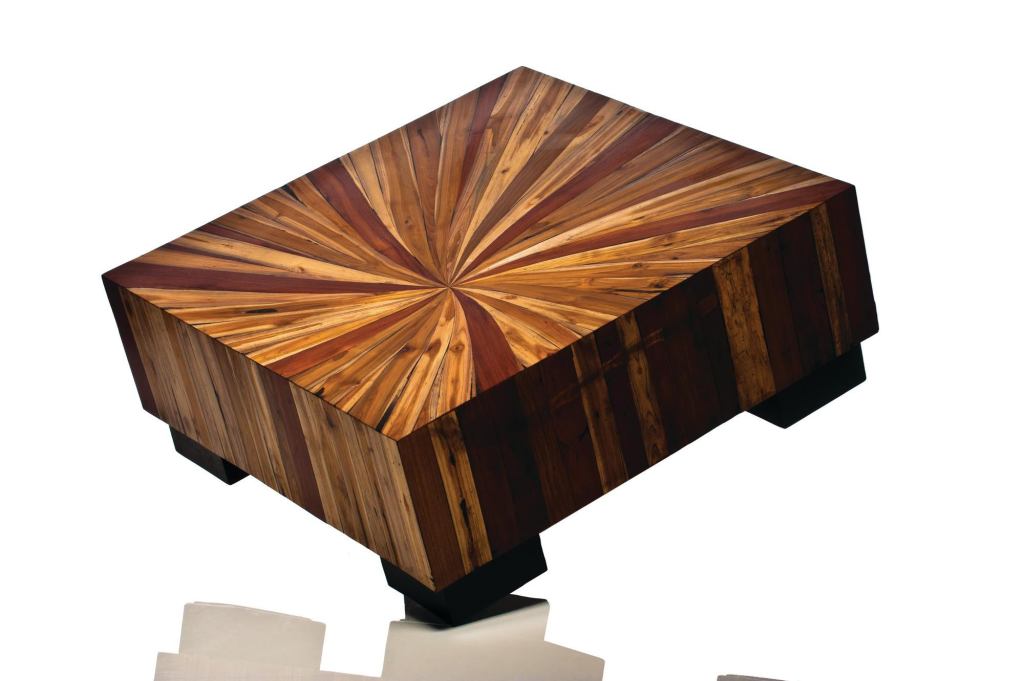 The Starburst line of tables from Phillips Collection is made from environmentally friendly wood, vine, bark, branch, and renewable resources. Five options are available: dining table (42" wide and long and 33" high), a bar table (59" wide by 18" long by 41" high), a barstool (16" wide by 14" long by 39" high), and two coffee tables, one 39" in diameter and 16" high, and the other 40" wide and long by 16" high. phillipscollection.com