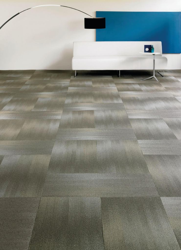 Manufactured by Shaw Contract Group, 18X36 is a rectangular carpet tile on EcoWorx backing that contains 40% pre-consumer recycled content and can be recycled by Shaw at no cost at the end of its lifetime. The surface is made of Eco Solution Q nylon, which contains 25% pre-consumer recycled content, and is completely recyclable into new nylon. Tiles in the collection come in a unique shape (18" wide by 36" long) and in five patterns: fade, blur, overlay, laser cut, and scale. shawcontractgroup.com