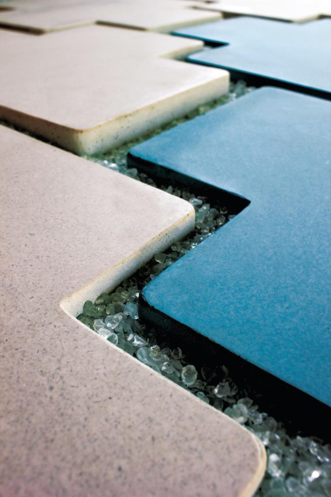 Meld USAs Plus Plus Pavers allow water to reach soil and plants to avoid runoff and create green space among concrete. They allow a wide variety of configurations and can be used in gardens, driveways, and patios. All pavers are formed with eco-sensitive cement-based composite materials and made of up to 74% recycled content. They are wet cast, air cured, and form finished, enabling a low-embodied-energy manufacturing process. The pavers are available in all standard and custom colors. meldUSA.com