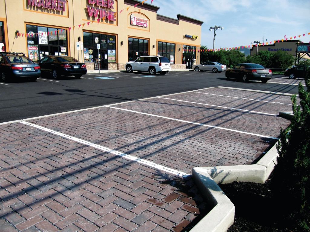 Eco-Ridge from Nicolock is a line of permeable pavers that offer the look of natural stone. Designed for installation in a 90-degree herringbone pattern for better structural performance, the pavers have a profiled surface texture and come with the companys Paver-Shield protection. They can also be laid mechanically in large areas where economical installation is needed. The product line eliminates up to 100% of runoff and directs stormwater to 1/2" gaps and a permeable base. They are suited for driveways, parking lots, and roadways and are available in two colors. nicolock.com