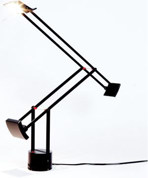 Richard Sapper's Tizio desk lamp is an icon in the catalogue of great lights. The integrity of its design, which relies on a small light source, has stead it well as lamp technologies have evolved, and allowed it to remain as one of the “it” design objects to have. Its aesthetic and technical perfection is achieved through its construction: two counterbalanced arms allow it to move with tremendous ease and serve as the electrical conduit for the lamp's power supply, a 12V transformer in its base. But it is its use of low-voltage lighting (originally using a halogen lamp) that provides directed task illumination in a small footprint. The lamp's sculptural qualities and technical performance garnered it the prestigious Compasso d'Oro award in 1979.
