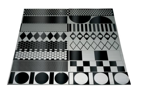 Lasertrons etched stainless steel backsplashes start as a single piece of mirror-finish stainless steel. During the manufacturing process, pattern outlines are masked and the exposed area is brushed with an abrasive. No toxic chemicals are used. Geometric patterns include squares, circles, and diamonds. Panel sizes can be made up to 48" by 96". ¢ lasertrondirect.com